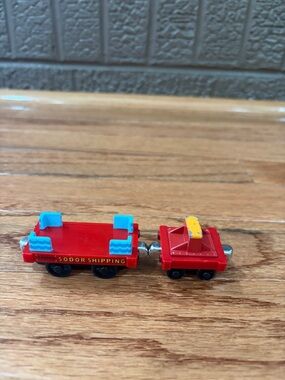 Thomas & Friends Red Sodor Shipping Train Cars with Blue Seats and Yellow Cargo